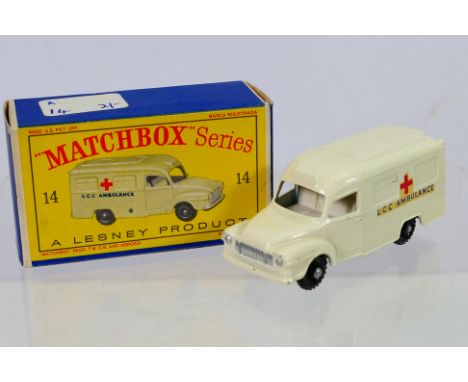 Matchbox - A boxed Matchbox Regular Wheels 14c Lomas Ambulance. The model with off white body, features silver trim to grille