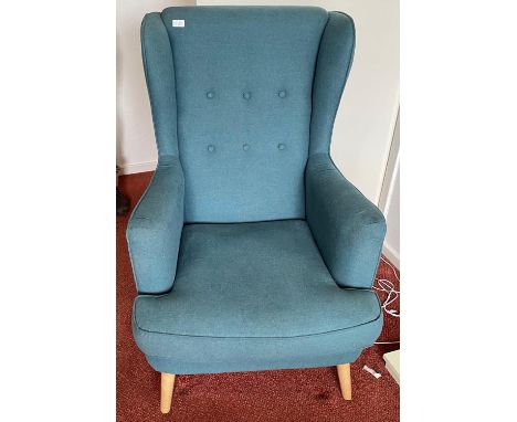 A modern (only a couple of years old!) easy lounge chair in blue fabric with nice light ash legs - still with fire retardant 