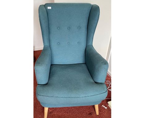 A modern (only a couple of years old!) easy lounge chair in blue fabric with nice light ash legs - still with fire retardant 