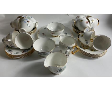 A 6 cup SALISBURY bone China tea set with saucers and side plates and milk and sugar and cake plate  with another Bone China 