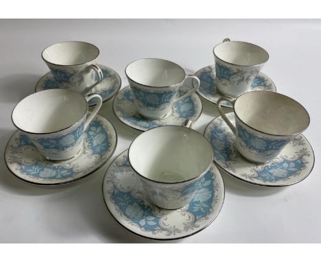 A part tea service of AYNSLEY MOONLIGHT ROSE consisting of 6 cups and saucers. Cup measures 6cms and saucer 13cm approx.Appro