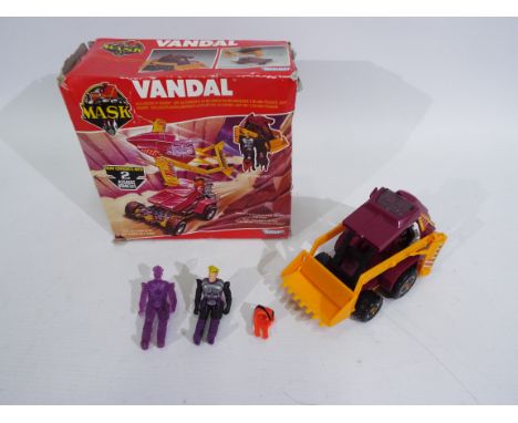 MASK - Kenner - Vandal. A boxed Mask 'Vandal' from 1987. Mask Bulldozer / Reconnaisance  Plane and Armoured Jeep with 2 actio