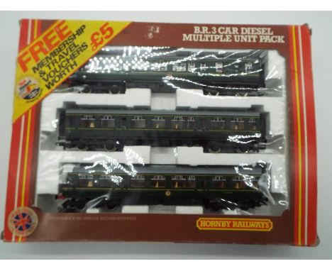 Hornby - an OO gauge boxed set, B.R. three car diesel multiple unit pack, powered motor brake composite, motor composite and 