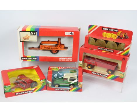 Britains - Five boxed Britains 1:32 scale model farm implements / accessories. Lot consists of Britains #9512 Farm Land Rover