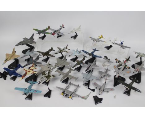 Atlas, Deagostini, Corgi, Fabbri - A squadron of over 30 unboxed unmarked diecast model military aircraft in various scales. 