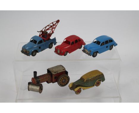 Tri-ang - Minic - Wells - 5 x clockwork vehicles including Morris Recovery Truck, Standard Vanguard, Austin Devon all with pl