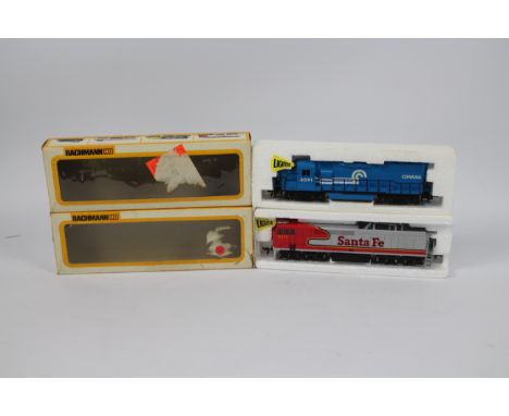 Bachmann - 2 x boxed Bachmann HO locos, a General Electric E60CF Electric in Santa Fe livery # 740 and GM Electro Motive Divi