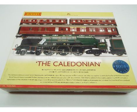 Hornby - an OO gauge boxed set, The Caledonian, 4-6-2 'King George VI' locomotive, two composite coaches and one brake coach 