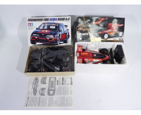 Tamiya, Nikko - A boxed 1/24 scale #24080 Ford Sierra 'Eggenburger' rally car model kit (Model kit is presented in a factory 