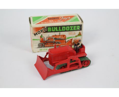 Moko - A rare 1940s Moko Bulldozer in red with brown driver and green rubber tracks which are still pliable and turn easily. 