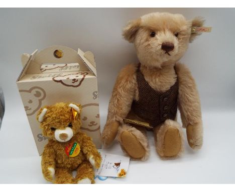 Steiff - two mohair Bears by Steiff, one in gold colour, yellow tag # 022784 and button to the ear, 20 cm in original Steiff 