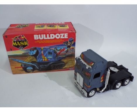 MASK - Kenner - Bulldoze. A boxed Mask 'Bulldoze' from 1987. Mask Diesel Truck/Armoured Half-Track with action figure 'Boris 
