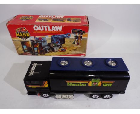 MASK - Kenner - Outlaw. A boxed Mask 'Outlaw' from 1987. Mask Venom Oil Tanker / Mobile Headquarters with 2 action figures 'N