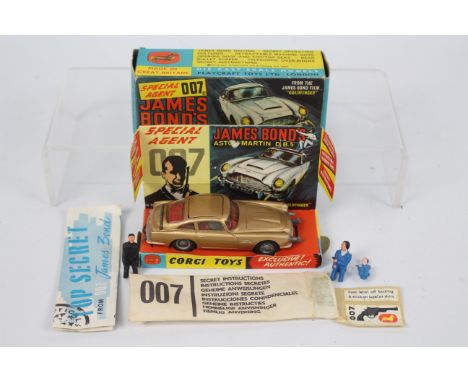 Corgi Toys - 007 - No. 261 James Bond Aston Martin DB5 comprising gold body with red interior and wire work hubs, mechanisms 