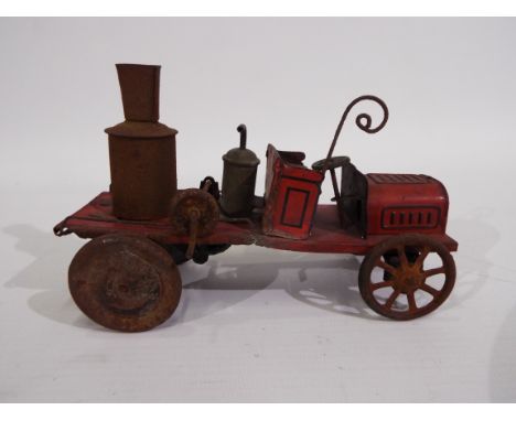 Bing - A rare early Bing tinplate Fire Engine with mechanical water pump. It may have had some modifications, the rear axle a