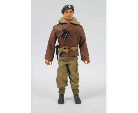 Palitoy Action Man - An unboxed Palitoy brown flock haired Action Man with gripping hands in Tank Commander Outfit. The figur