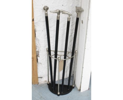 WALKING STICK RACK, in chromed metal, 32cm x 17cm x 51cm H plus four various walking sticks, 95cm H. (5)