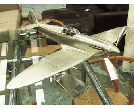 SPITFIRE, in aluminium cladding scale model on stand, 60cm x 38cm H.