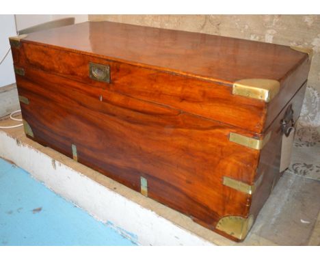 TRUNK, 19th century camphorwood and brass bound with rising lid and carrying handles, 50cm H x 103cm W x 45cm D.