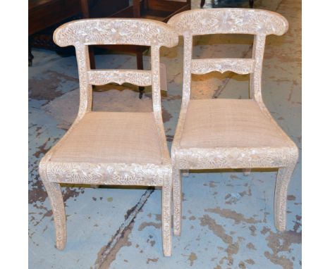 SIDE CHAIRS, a pair, of Moorish style mother of pearl mosaic with linen coral drop in seats and sabre supports. (2)