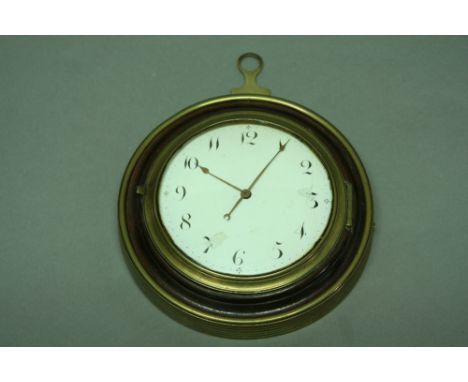 A SEDAN CLOCK with watch movement by Fras Pinney, London, in a mahogany and brass case with enamel dial dia 5.5" (14 cms)