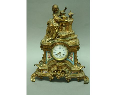 A FRENCH MANTEL CLOCK the striking movement with enamel dial, signed Stainville and Robin a Paris, ormolu case, surmounted by