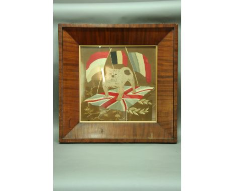 A SILKWORK PICTURE portrait of a bulldog standing on a union jack, in bold mahogany frame 18.5" (46.5 cms) x 18.5" (46.5 cms)