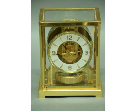 A JAEGER LE COULTRE MANTEL CLOCK white chapter ring in brass and glazed case no. 279796 9" (22.5 cms) with travelling box