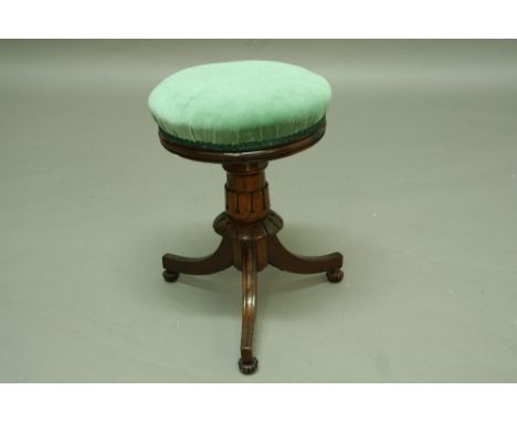 A REGENCY ROSEWOOD PIANO STOOL with tripod base and adjustable for height
