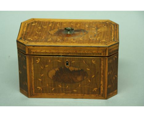 A GEORGE III TEA CADDY sycamore, with inlaid oval panels and leaf sprays