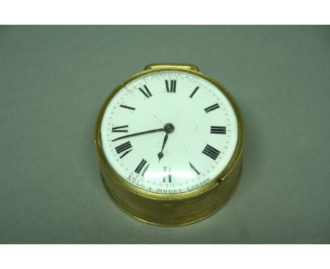 A TRAVELLING TIMEPIECE set in a brass case, the reverse inscribed Nos. 6 and 96, enamel dial inscribed Ed Sherman & Co and Bu