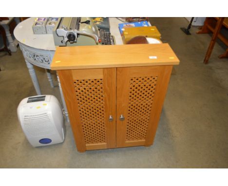 A light oak cabinet