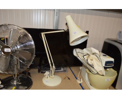 An angle poise style lamp