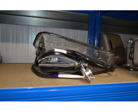 A stethoscope and a thermometer etc.