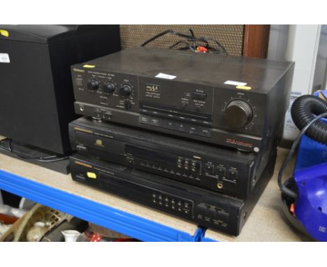 A Technics stereo integrated amplifier; together with a Marantz CD player; and a Marantz stereo tuner 