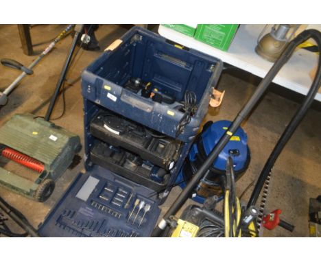 A plastic tool chest and contents of various drills etc.; together with an Einhell industrial vacuum cleaner