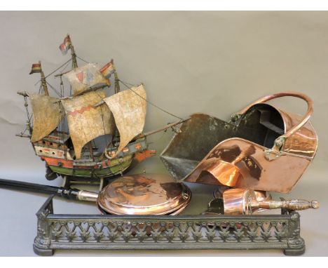 A quantity of 19th century and later copper and brass, to include fire irons and andirons, coal scuttle, bedpan, trivet, wate