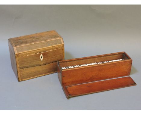 A set of bone and ebony 'double nine' dominos, fifty-five in the set, in a mahogany box, and an inlaid rosewood tea caddy