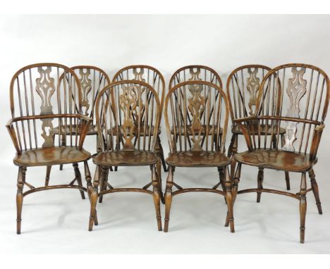 A set of eight modern Windsor stick back chairs, including a pair of elbow chairs