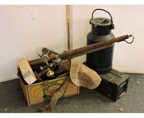 Old blacksmith's tools, large churn, diver's apparatus, cart lamps, etc