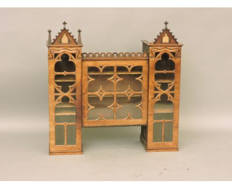 A Victorian mahogany Gothic bookcase top, with opening door to reveal shelving, an apprentice piece from the city of Carlisle