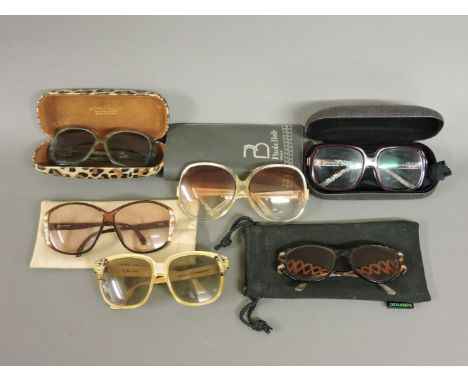 A collection of vintage sunglasses, including Pablo Picasso and Paola Belle