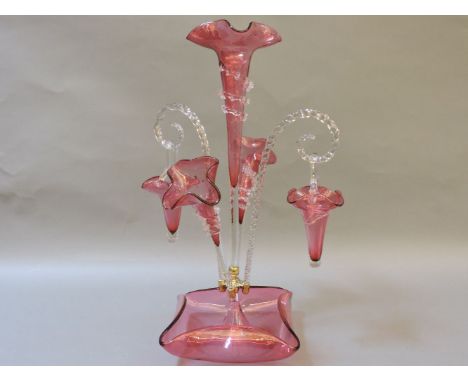A cranberry glass epergne, damaged