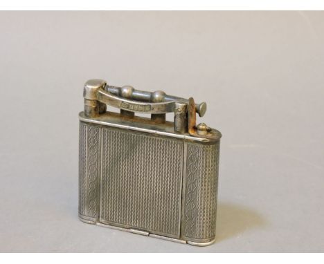 A 1930s Dunhill silver plated ladies combination lighter, compact and lipstick