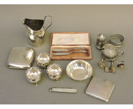 Silver items, to include a Georgian cream jug, two cigarette cases, cruet items, a small Chinese silver model of a merchant, 