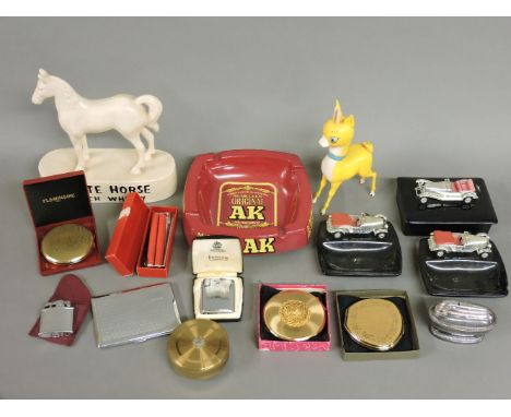 A collection of vintage smoking paraphernalia, together with a White Horse Whisky figurine