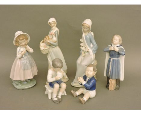 Two Lladro figures, a Nao figure, and three Royal Copenhagen figures