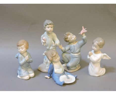 Four Nao figures, and a Lladro example