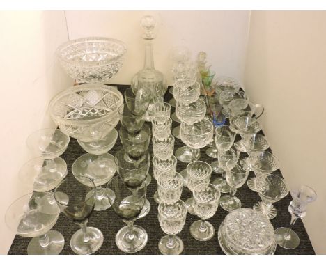 A quantity of Stuart leaf pattern drinking glasses, Webb drinking glasses, a decanter, a cut glass pedestal bowl, and other d