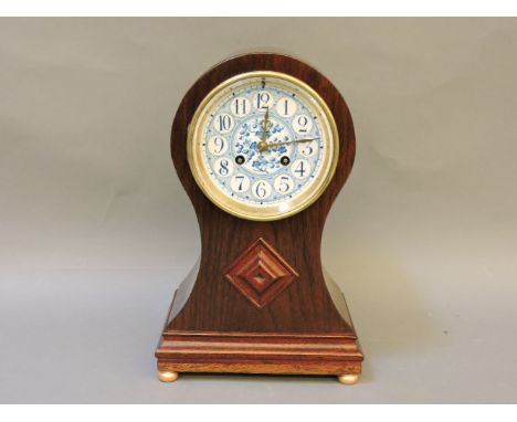 An Edwardian style mantel clock, ceramic dial, French drum movement, mahogany case, 32cm
